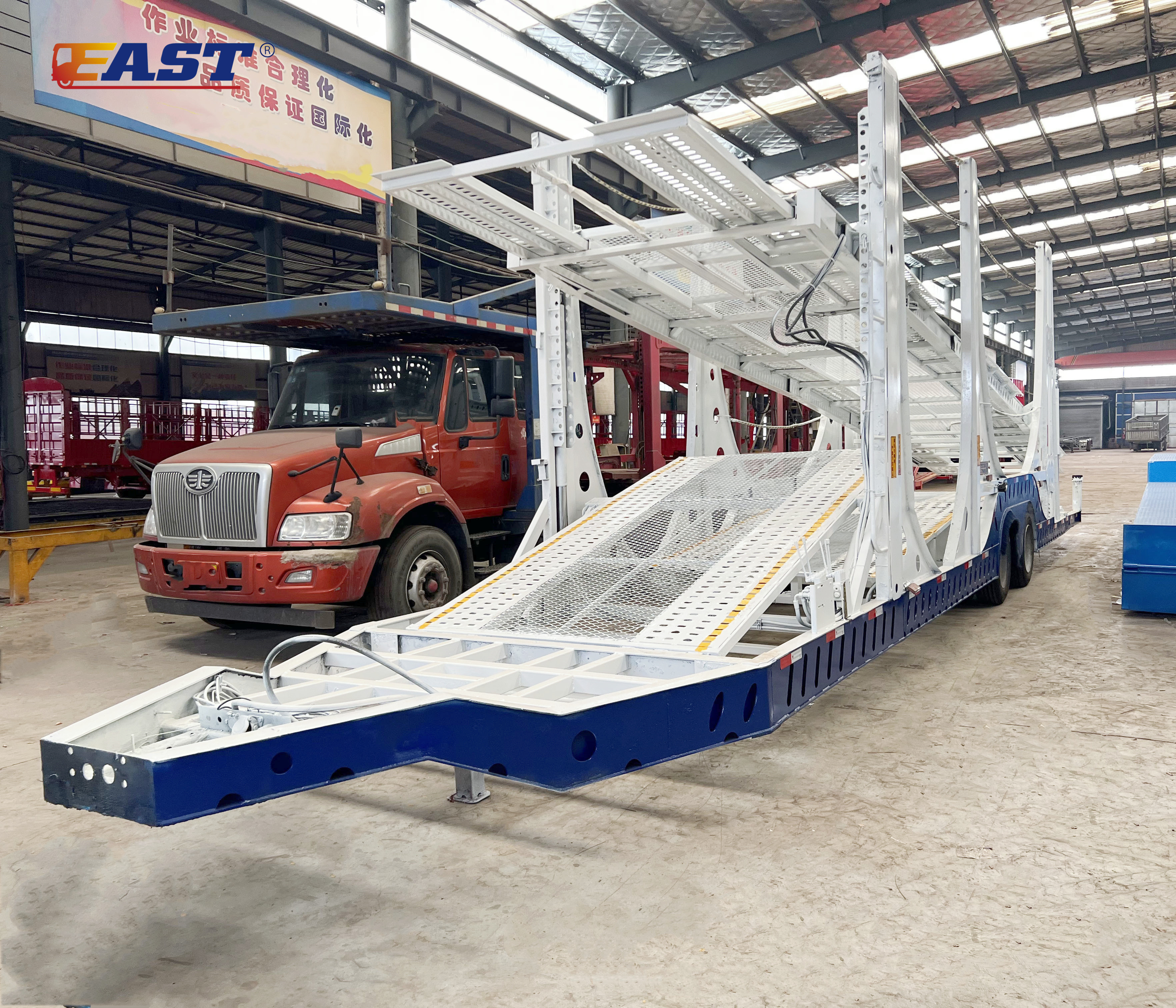 Customized trailers for transporting cars for Tajikistan customers.