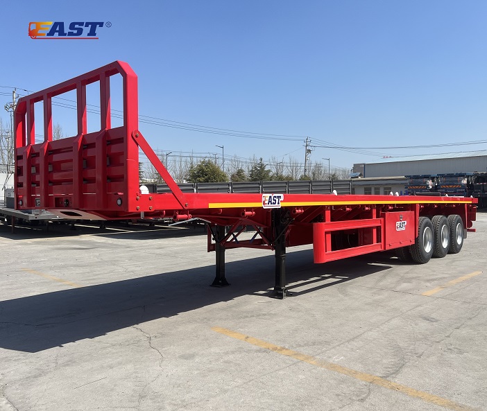 Front axle lift flatbed semi-trailer